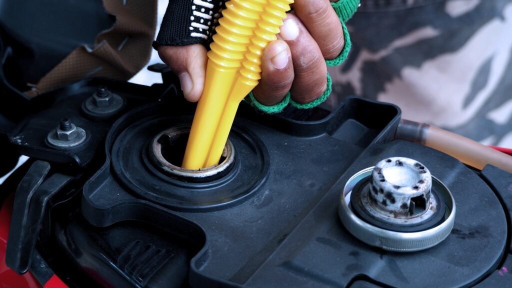 Fuel tank of motorcycle that opened and waiting for oil
